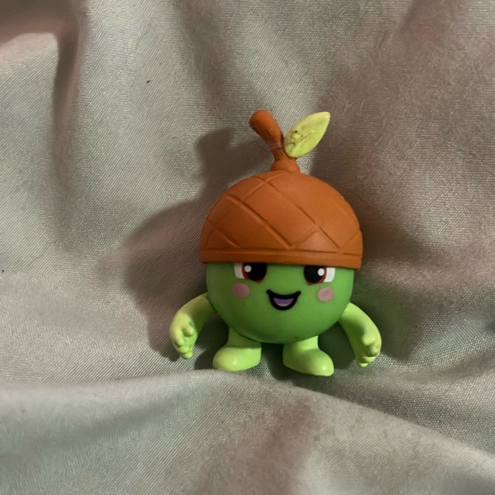 Green and Brown Acorn Cap Toy